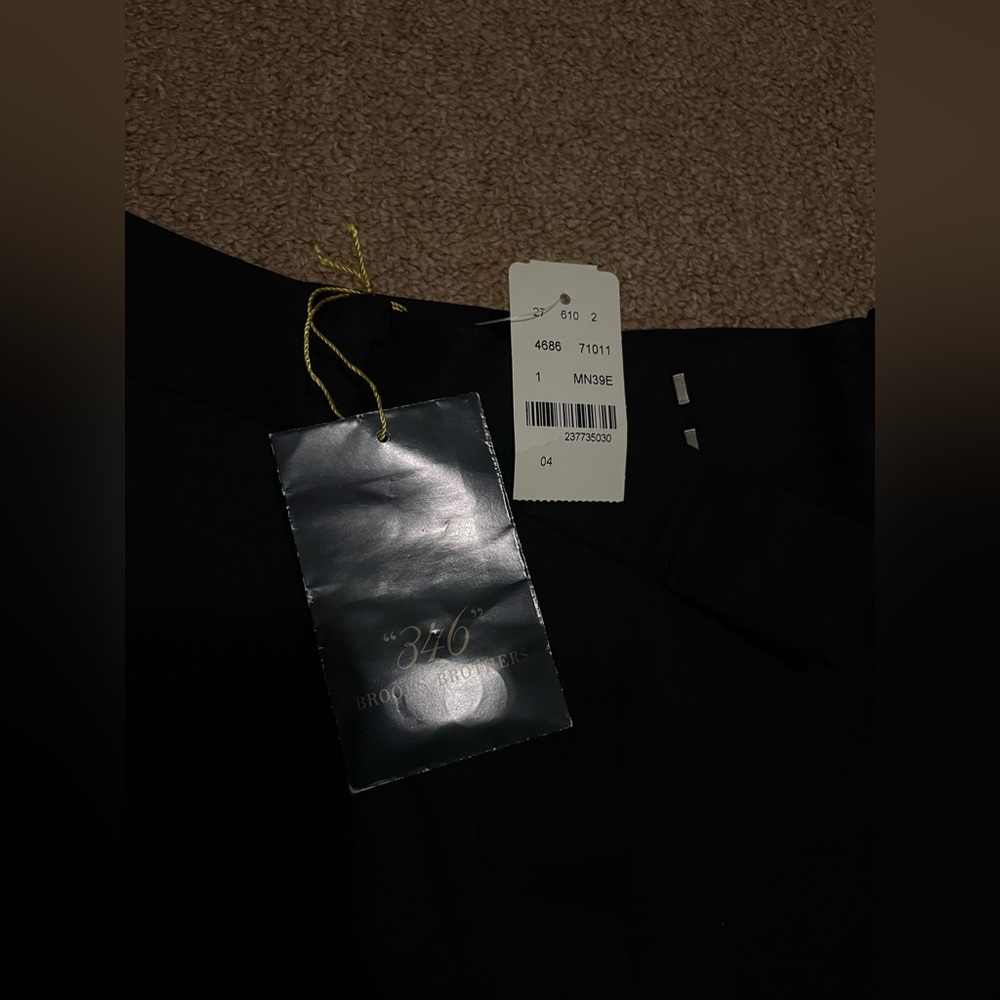 Never worn.Brooks brothers women’s trousers.Black.Sz 4.Retail price $198